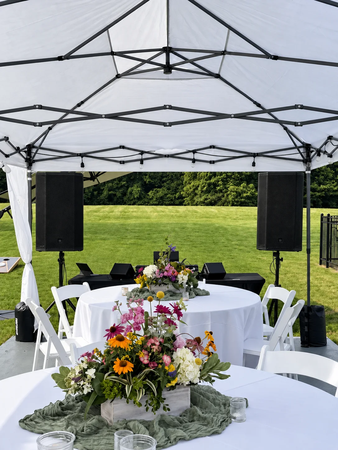 BFE Productions speakers positioned around an outdoor wedding reception
